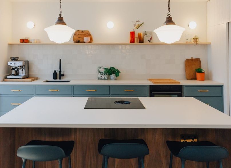 Bespoke kitchen island in walnut Beautiful Bespoke kitchen with stone worktops